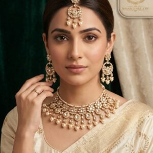 Exquisite Nayab Jewellery Royal Kundan Bridal Set: Gold Choker Necklace, Chandbali Earrings, Mang Tikka, & Ring with Freshwater Pearls